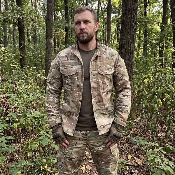 Camo combat uniform forest outdoor shot